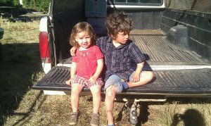 Ava and Everett - farm kids in the Ford truck.